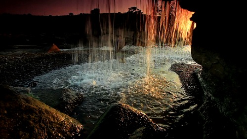    HD / Inside Shot of a Waterfall at Sunset HD